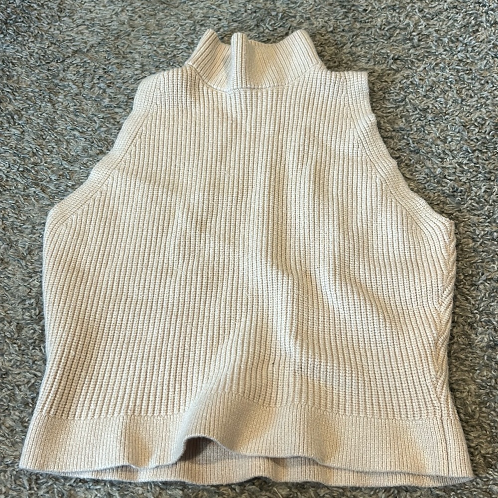 turtle neck sweater vest! super cute and comfy i just dont like turtlenecks!!